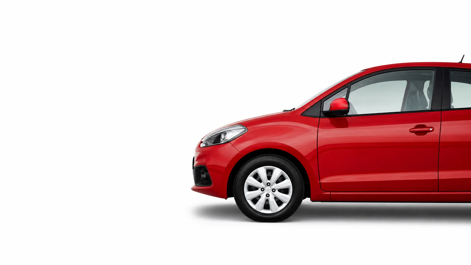 Front half of a red hatchback car shown in side profile against a plain white background, with the rear portion cropped off at the right edge.