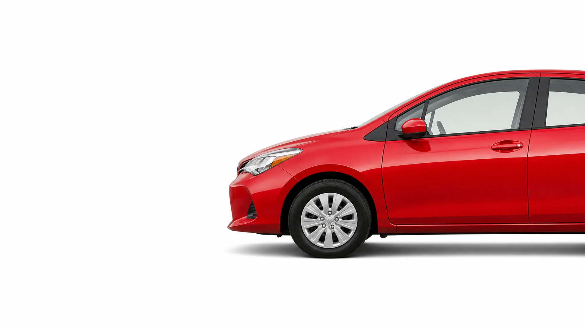 Front and middle portion of a red four-door car shown in side profile against a plain white background, with the rear of the vehicle cropped off.