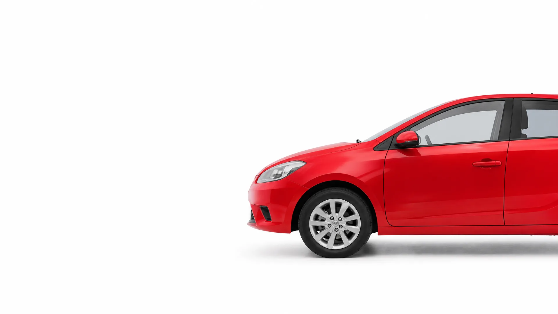 Front half of a red hatchback car, shown in profile against a plain white background with a soft shadow beneath it.