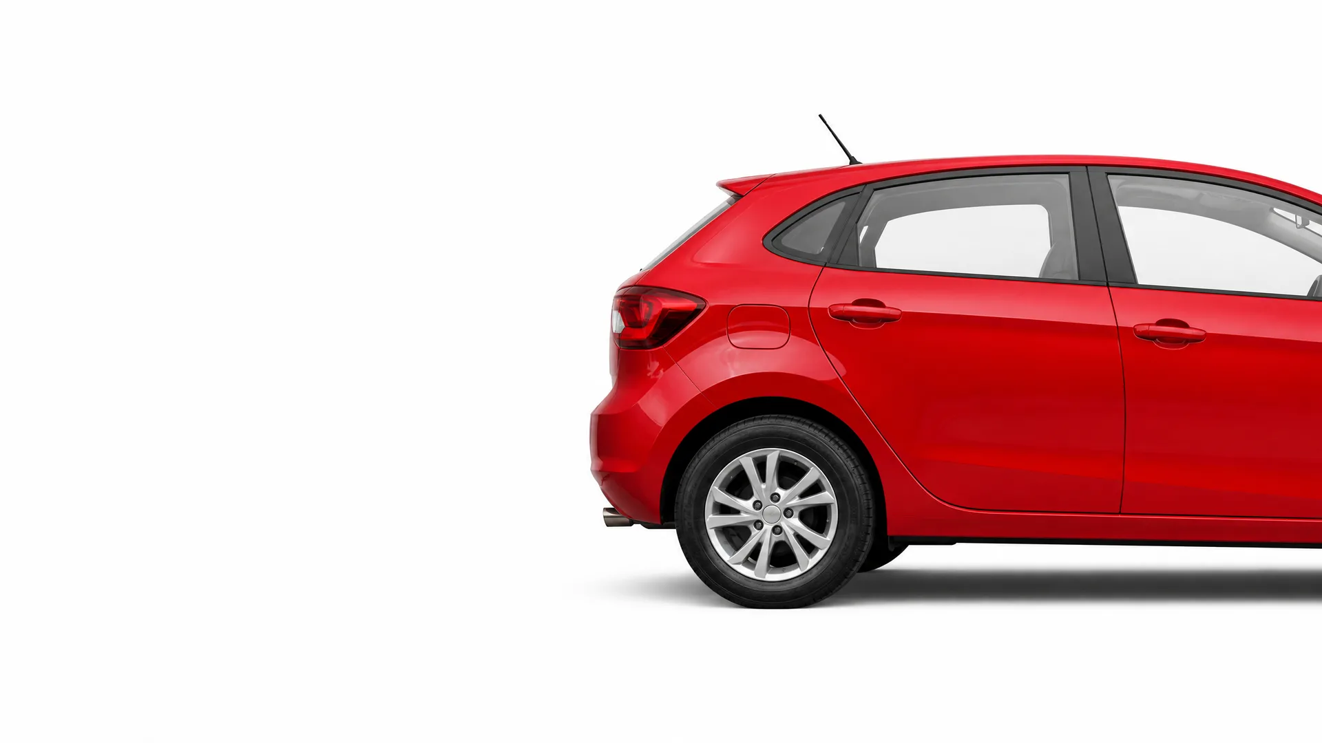 Rear half of a red five-door hatchback car shown in side profile against a plain white background.