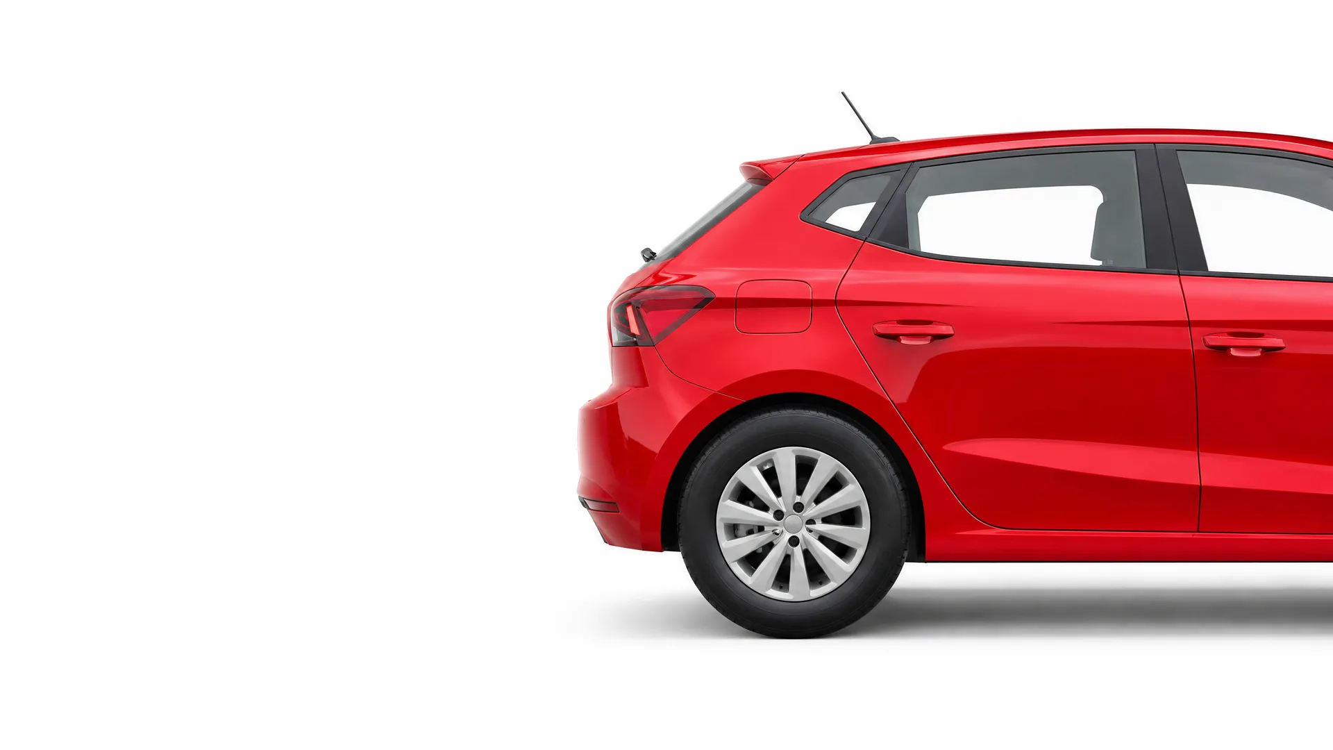 Rear half of a red five-door hatchback car shown in side view against a plain white background.