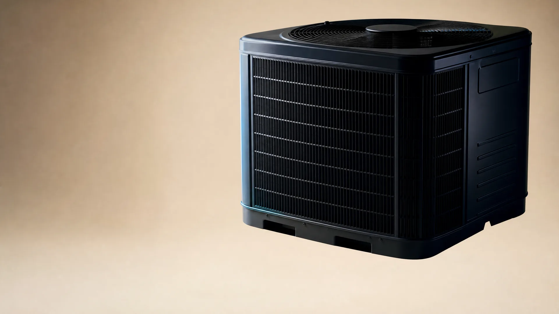 A black outdoor air conditioning condenser unit with a top fan grille and side coil fins, shown against a plain beige background.