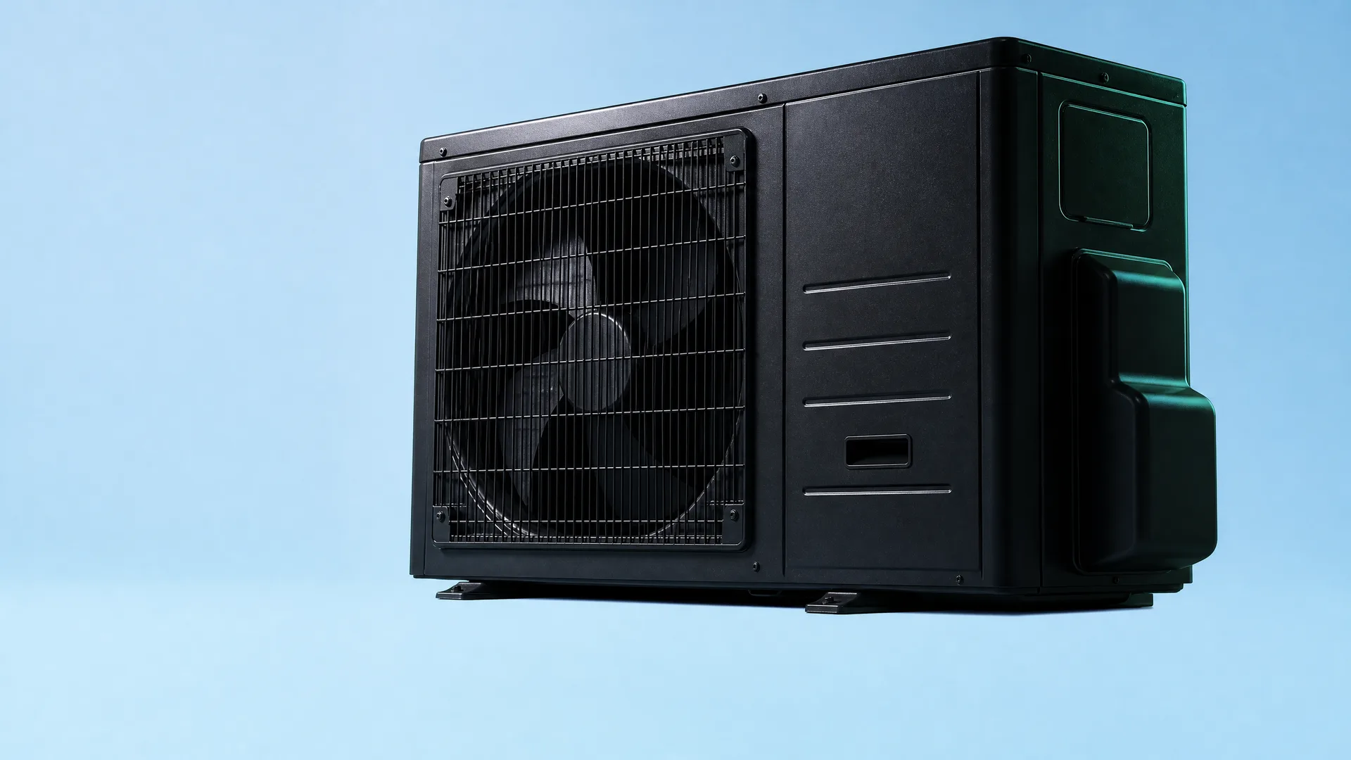 A black outdoor heat pump or air conditioner condenser unit with a grilled fan panel, shown at an angle against a plain light blue background.